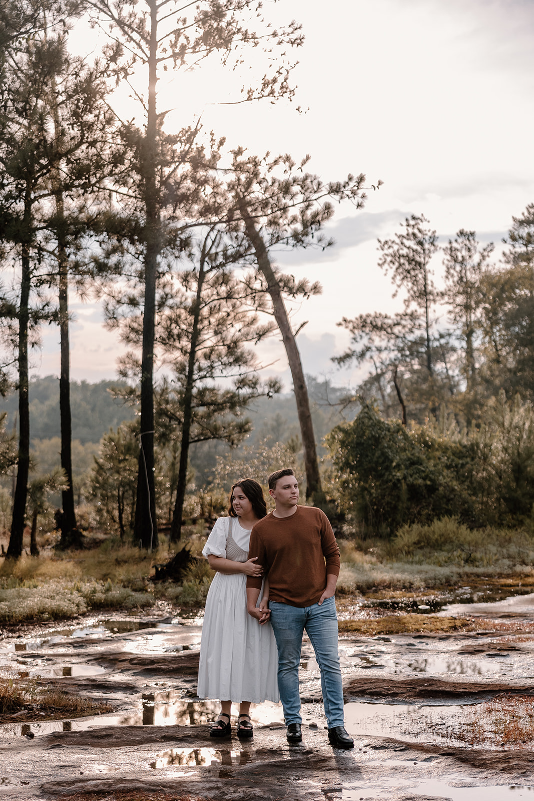 Adventure Couples Session with dreamy backdrops and golden hour mountain views in Arabia Mountain.