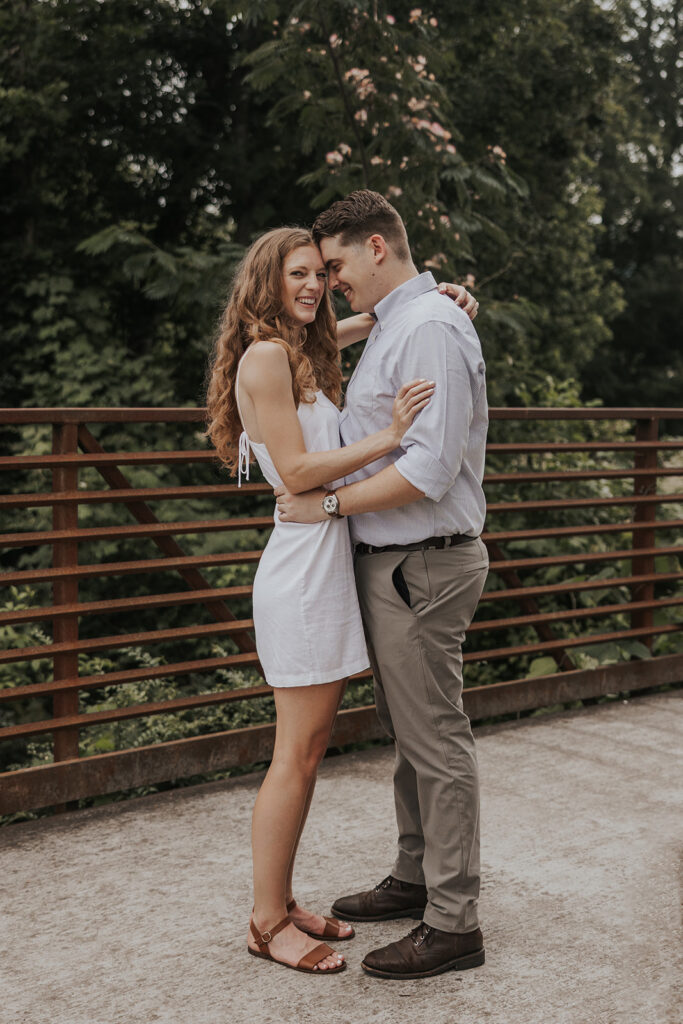 Stunning couple takes an intimate photo together during their Georgia engagement shoot