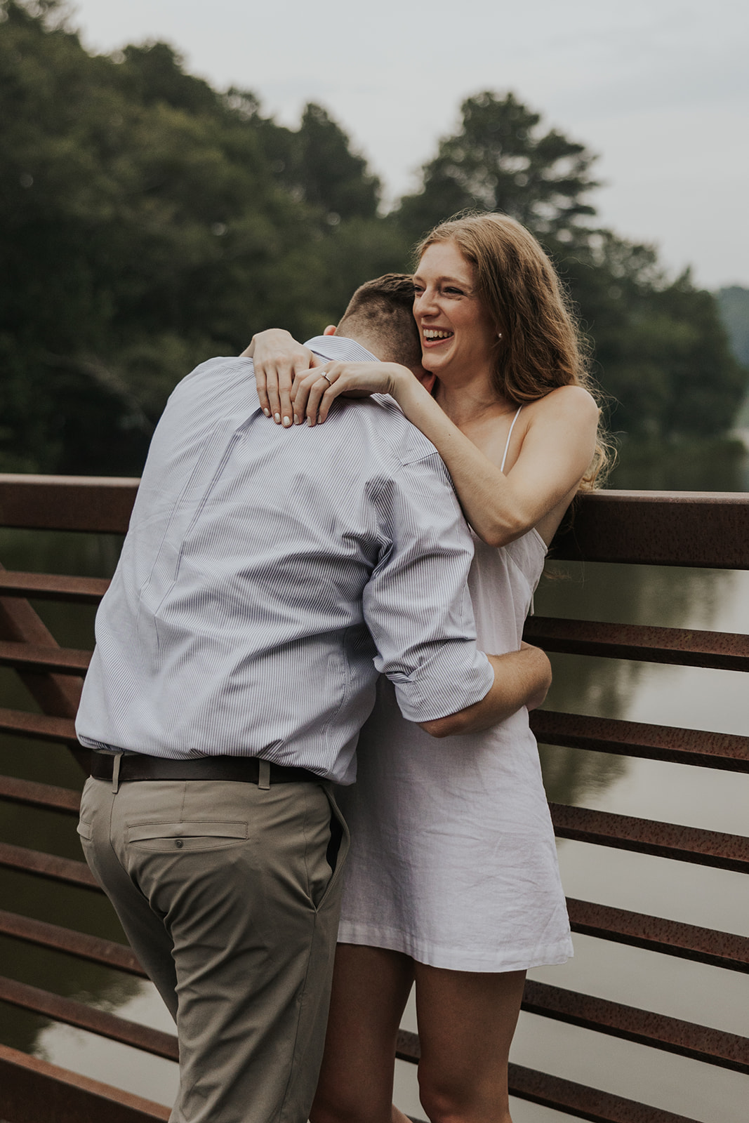 Stunning couple takes an intimate photo together during their Georgia engagement shoot. An intimate and cute couple photo idea