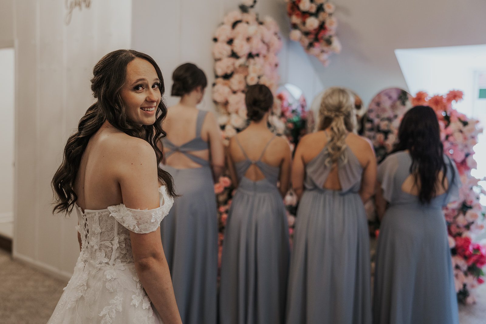 Bridesmaids prepare to see the stunning bride for the first time!