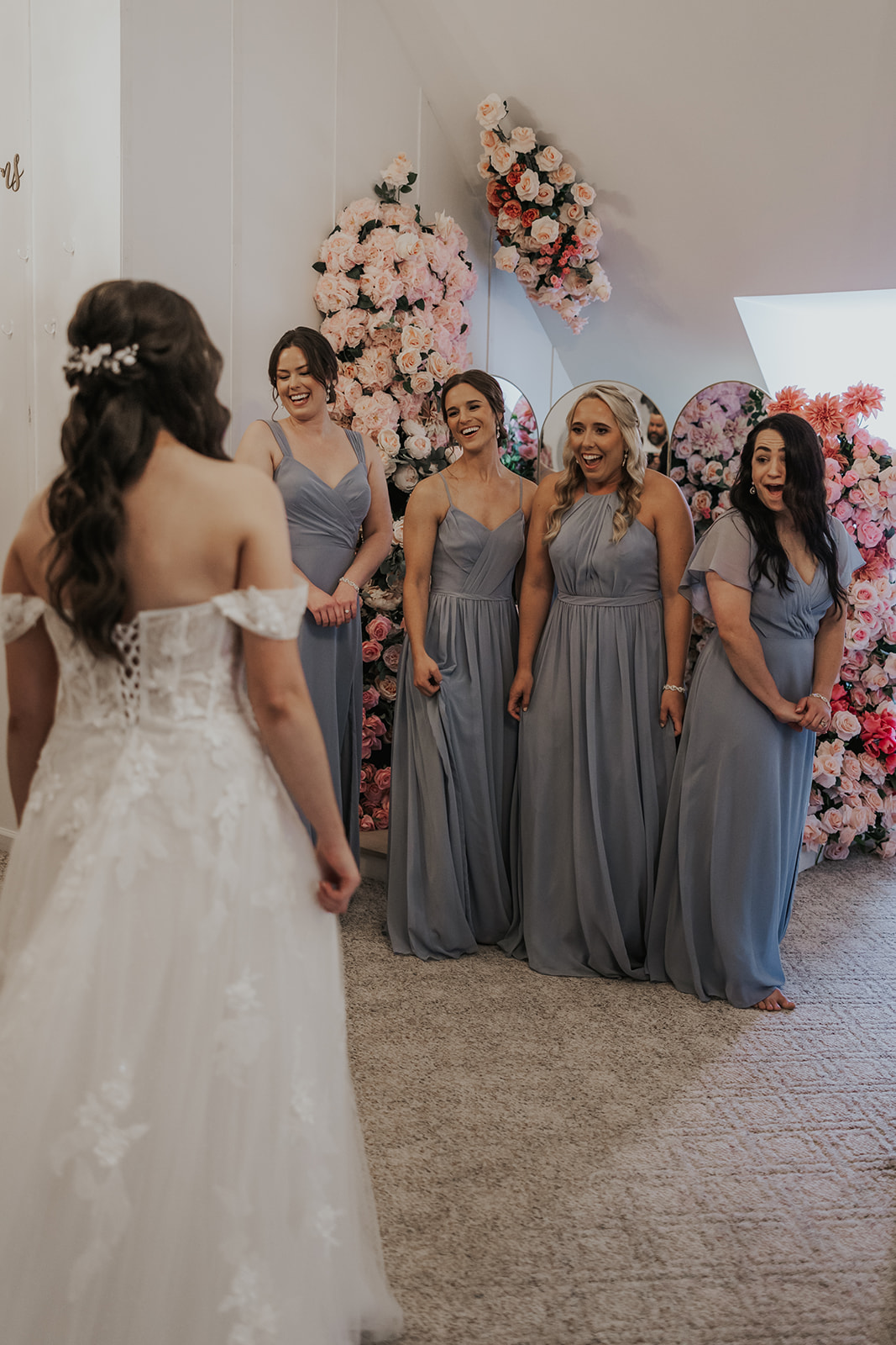 Bridesmaids react to seeing stunning bride for the first time on her wedding day