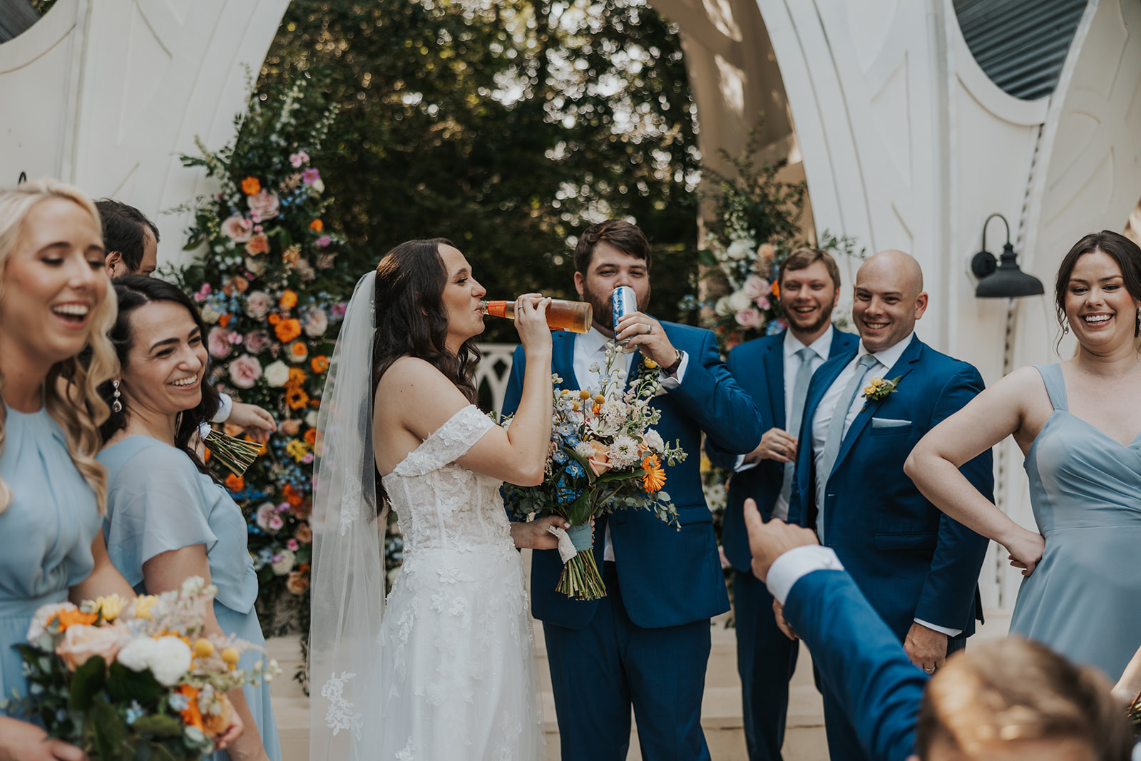 Bride and groom share a beer after their sentimental Georgia wedding