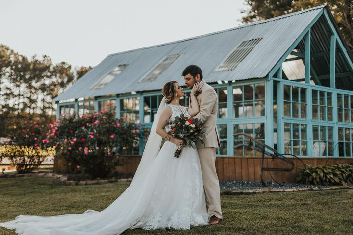 Stunning bride and groom share a dance outside of my favorite Georgia wedding venues