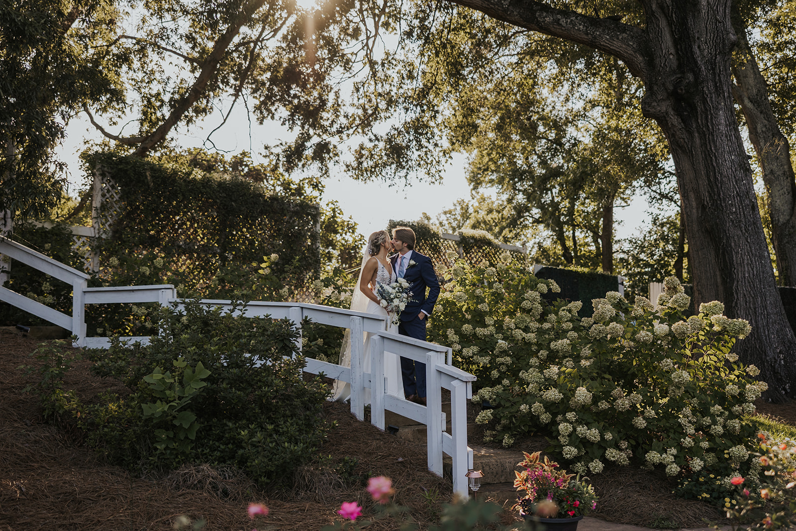 Bride and groom share an intimate moment outside of their stunning Georgia wedding venue