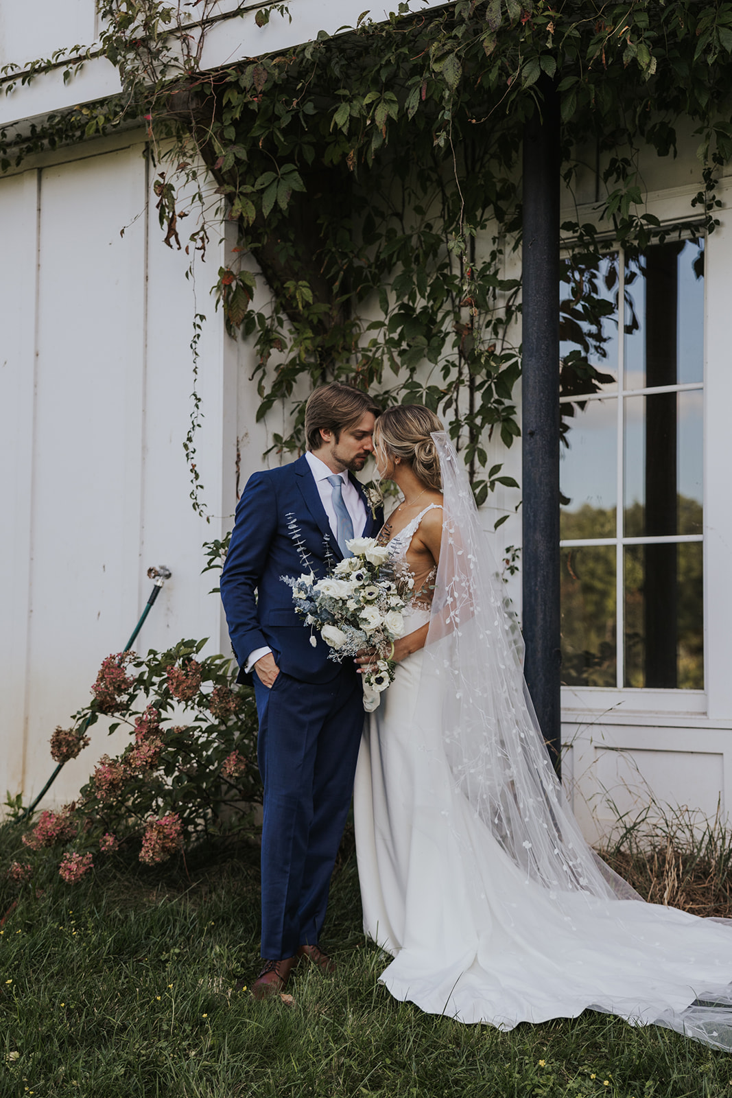 Stunning bride and groom share a kiss during their dreamy Georgia wedding