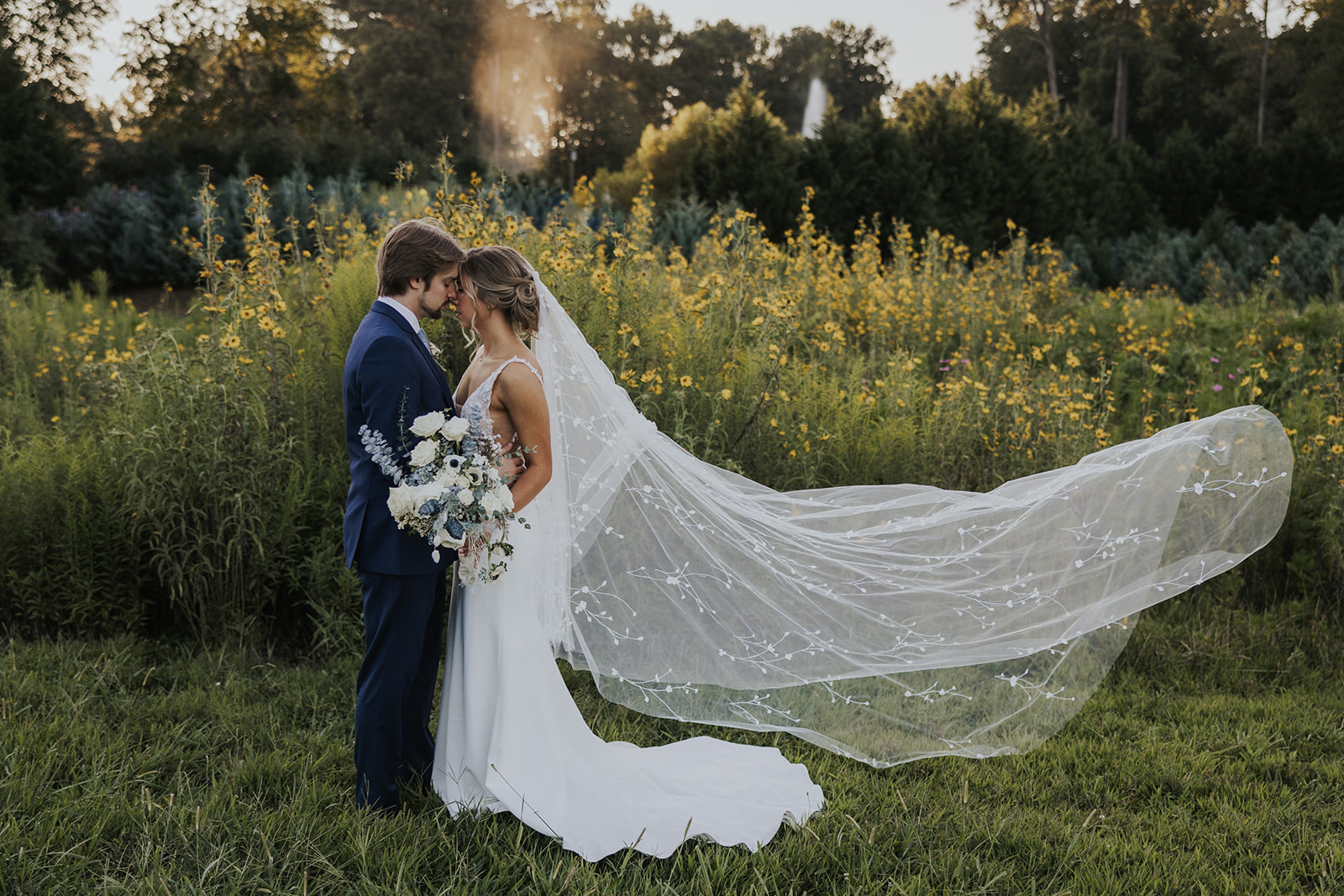 Stunning bride and groom share a kiss during their dreamy Georgia wedding