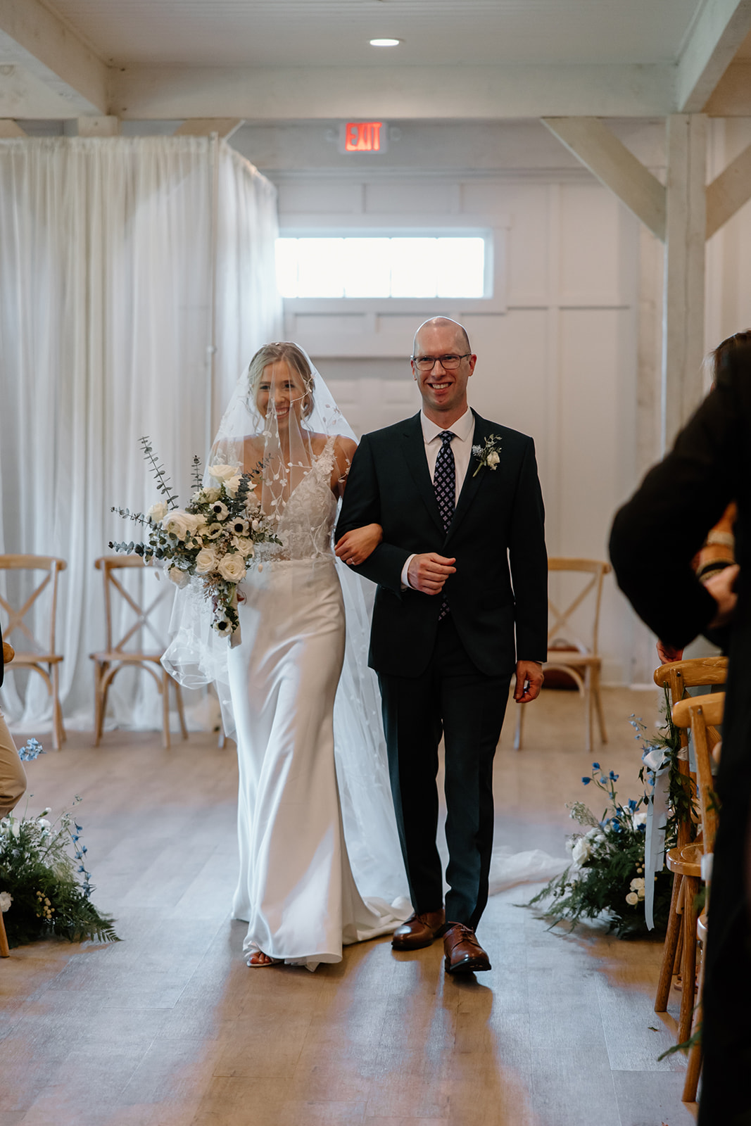 Bride is walked down the aisle by her father during her dreamy Georgia wedding day