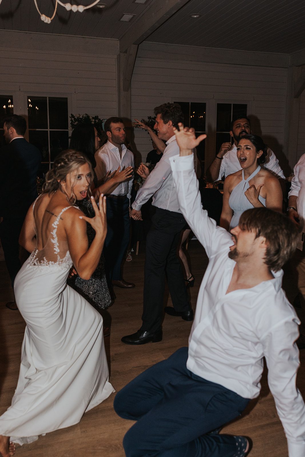 Stunning bride and groom dance with their guests at the end of their dreamy Georgia wedding day!