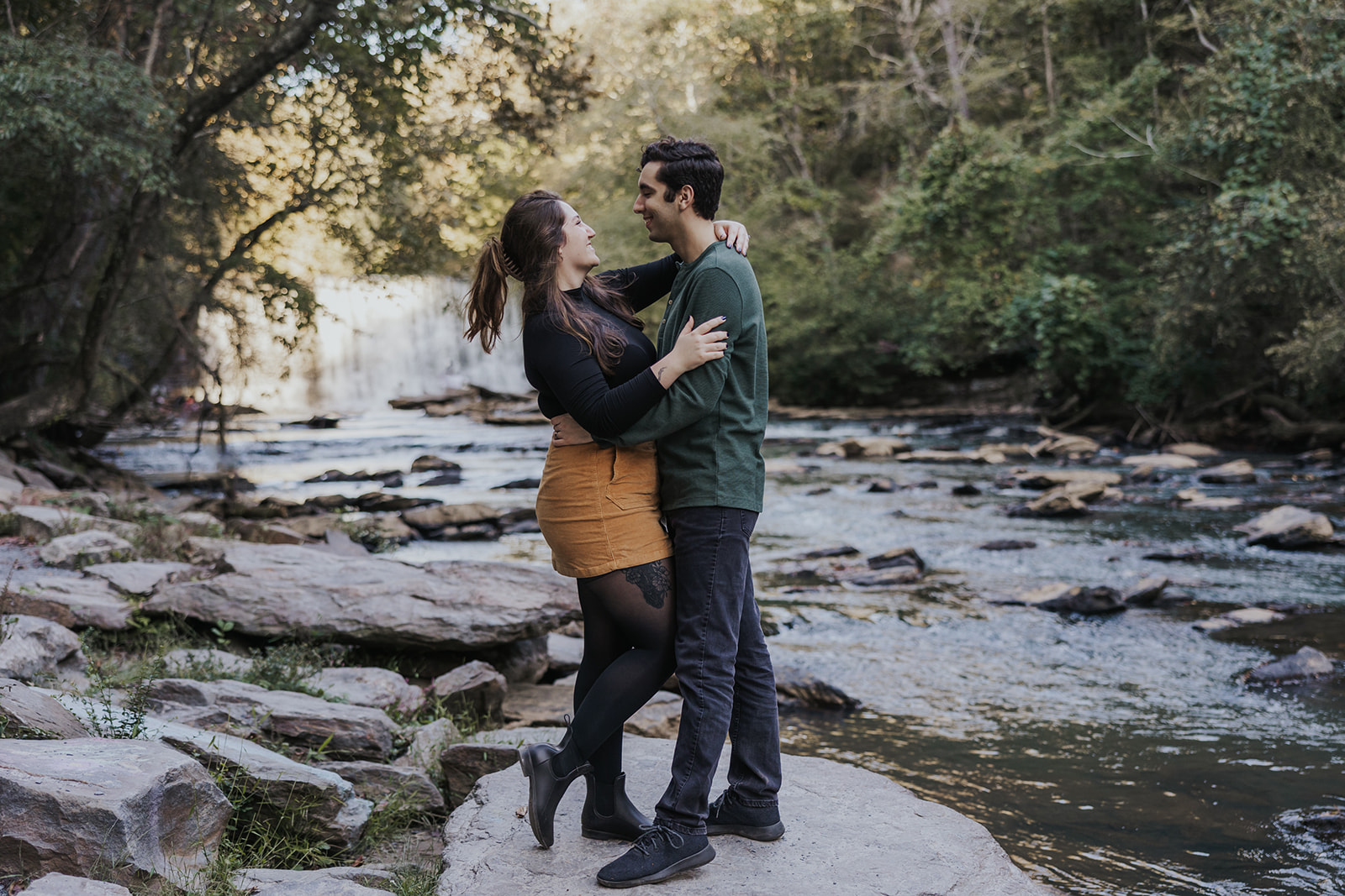 Stunning couple pose together at Roswell Mill. 