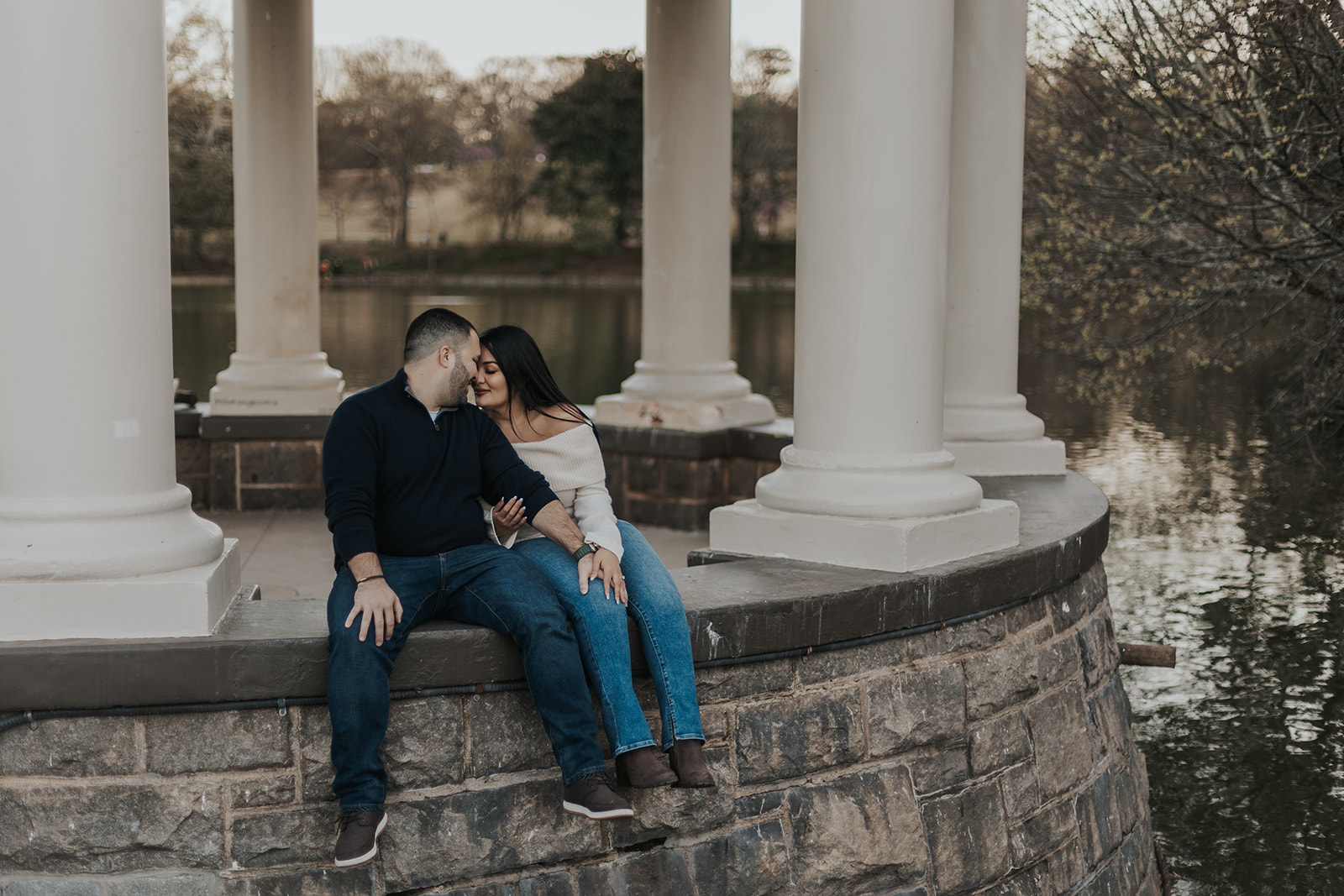 Stunning couple pose during their Atlanta Georgia engagement photoshoot in Piedmont Park.