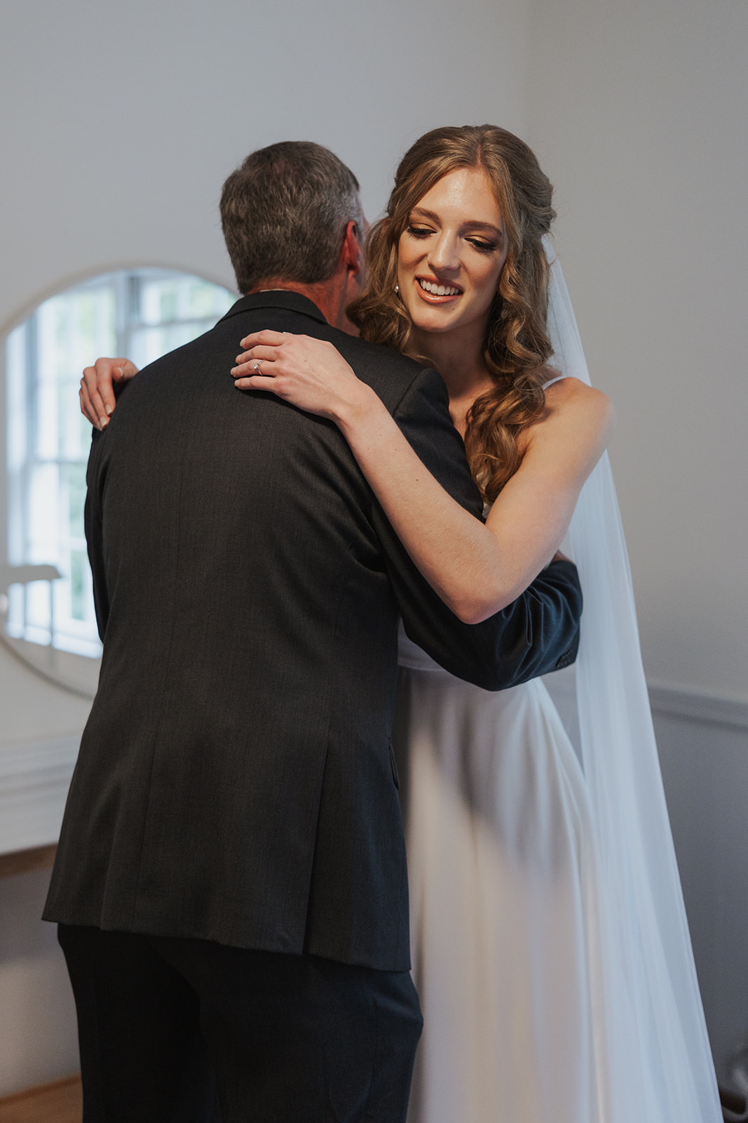 Brides father greets her on her stunning Georgia wedding day