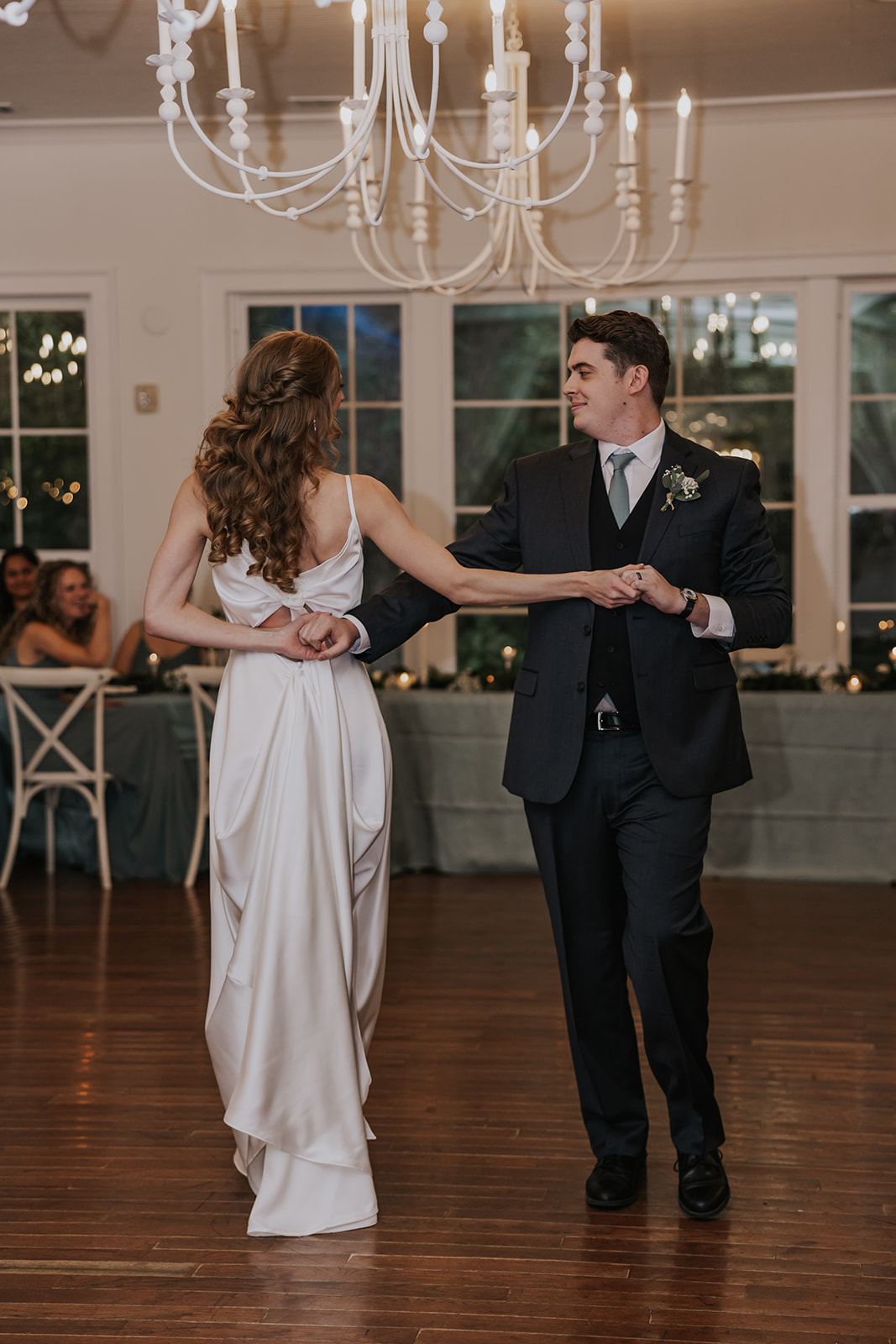 Bride and groom share their first dance together