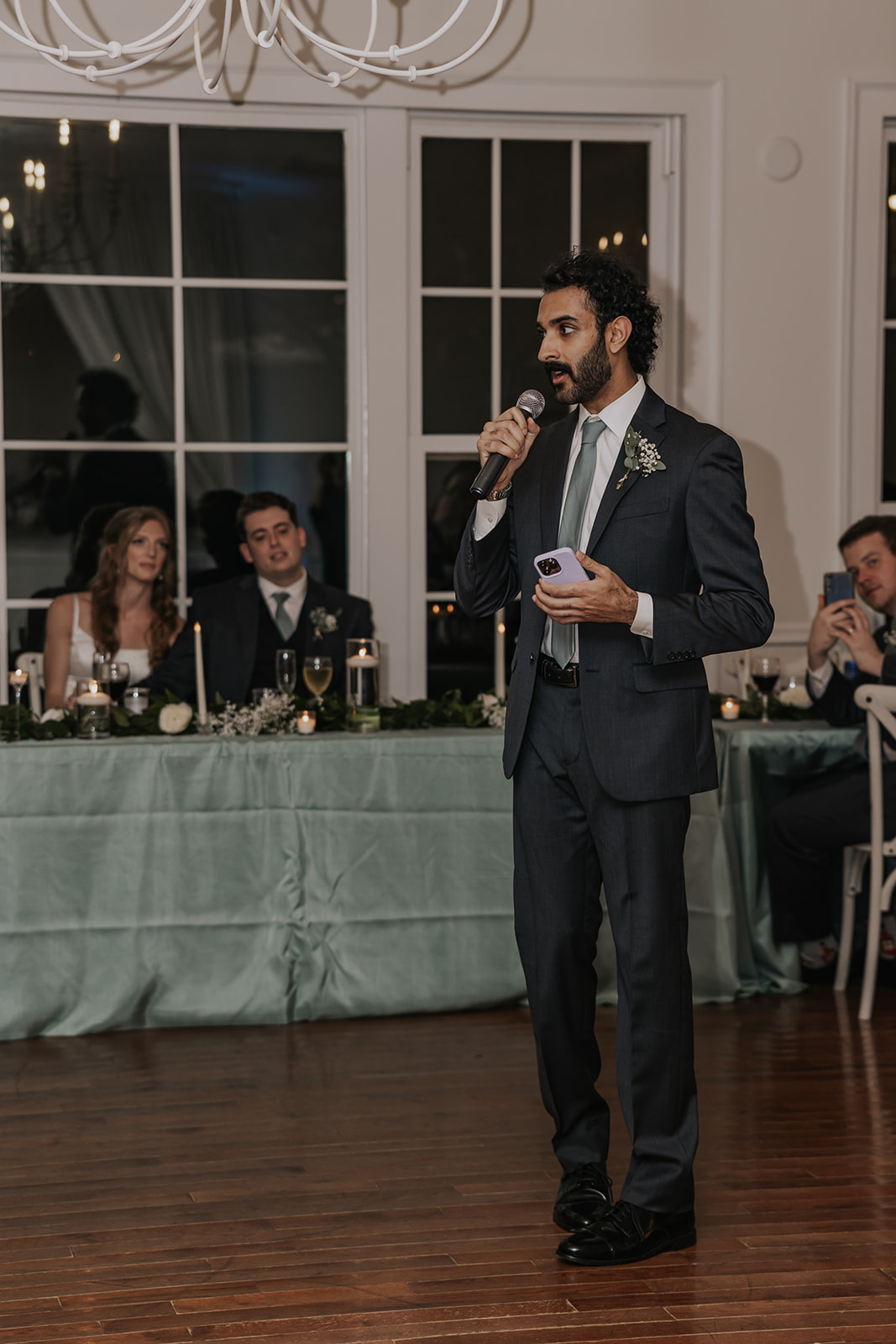 Groomsmen gives toast during the dreamy Georgia wedding reception
