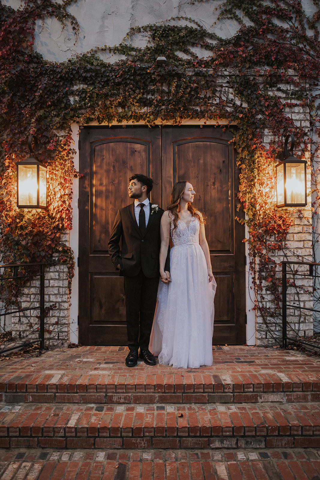 stunning bride and groom pose outside the church wedding venue