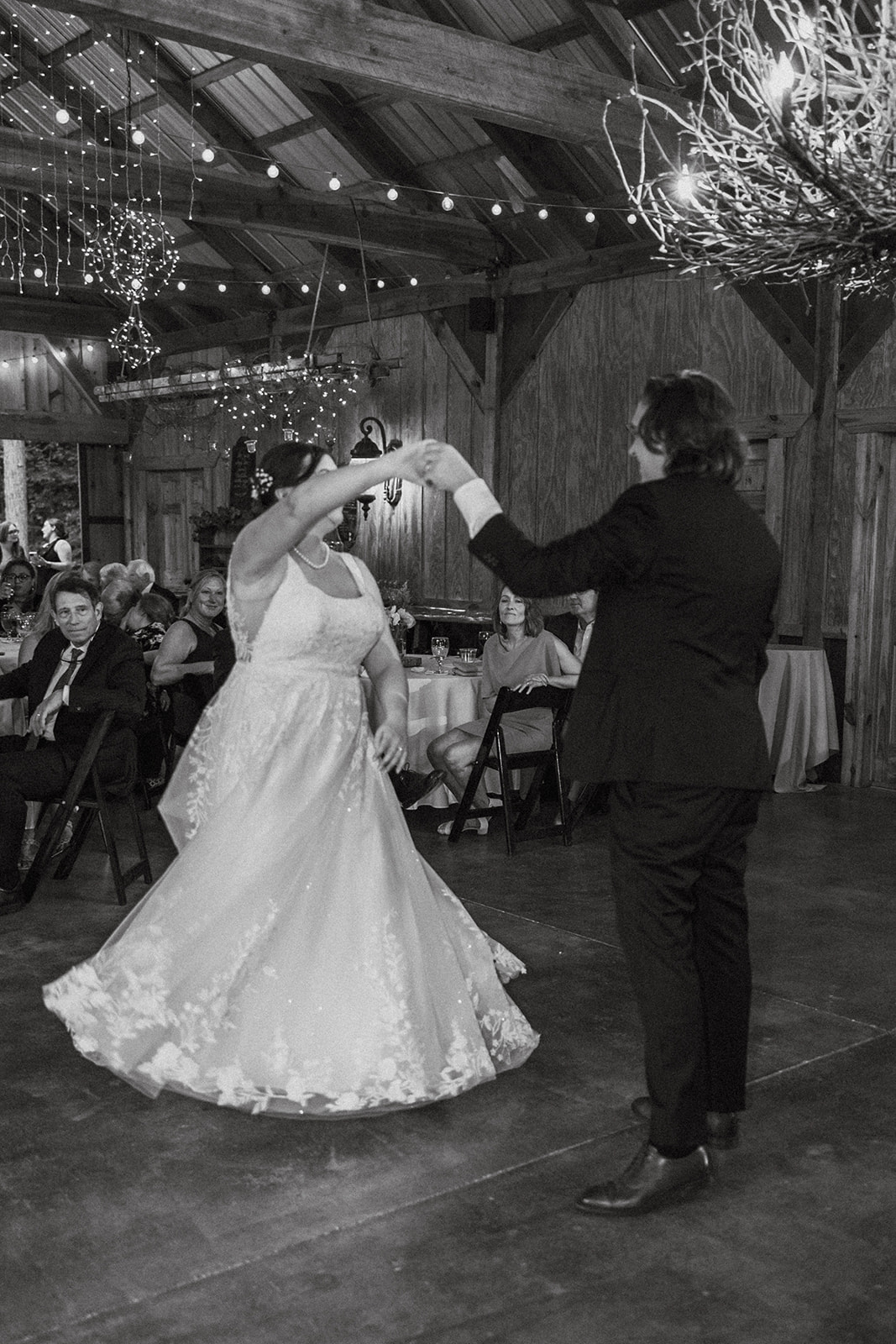 bride and groom share their first dance 