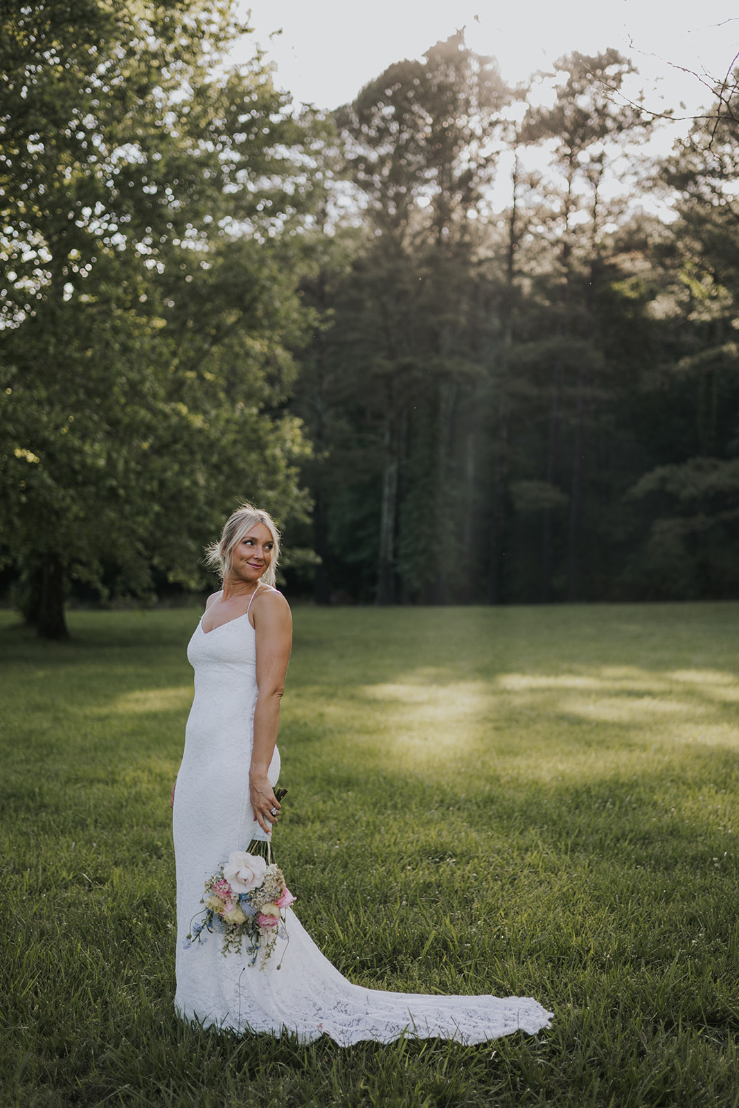 beautiful bride poses for a photo after her Georgia vow renewal