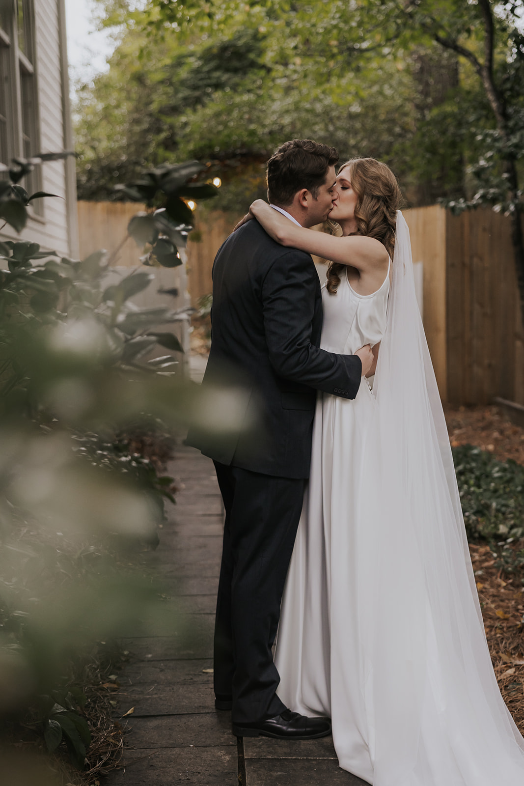 beautiful bride and groom pose after their dreamy wedding ceremony