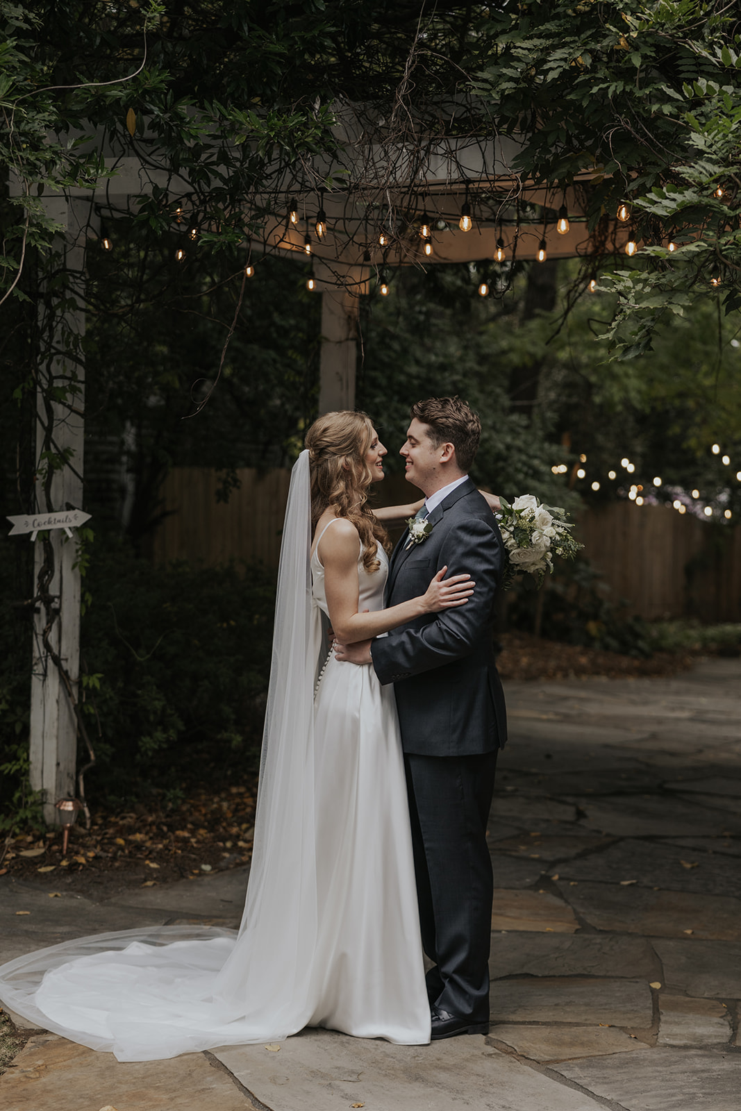 beautiful bride and groom pose after their dreamy wedding ceremony