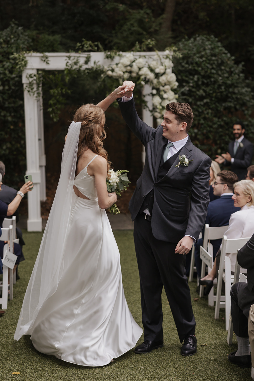 beautiful bride and groom pose after their dreamy wedding ceremony