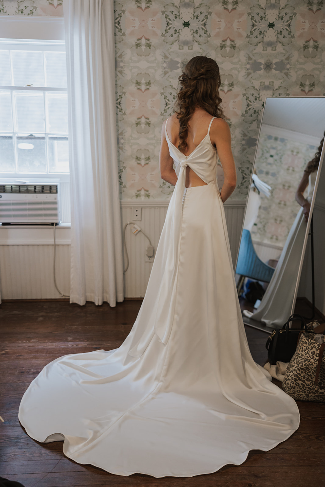 bride poses before her historic Georgia wedding