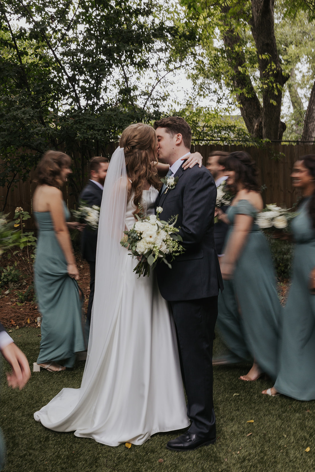 beautiful bride and groom pose after their dreamy wedding ceremony