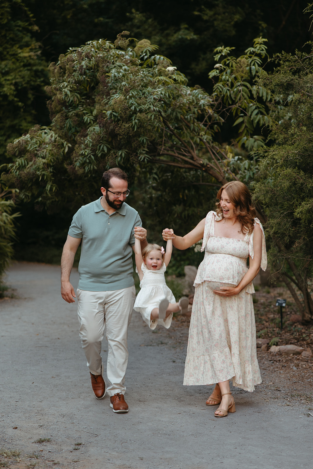 beautiful family poses together in a Georgia field