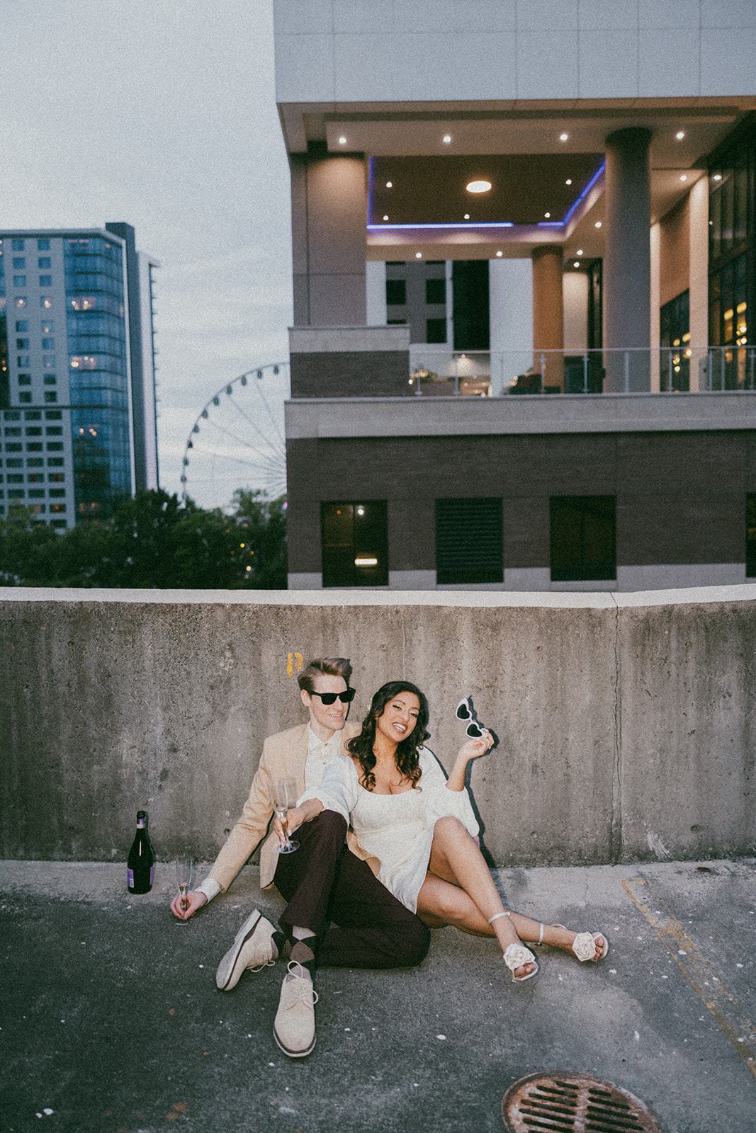 stunning couple pose together during their unique urban engagement photoshoot