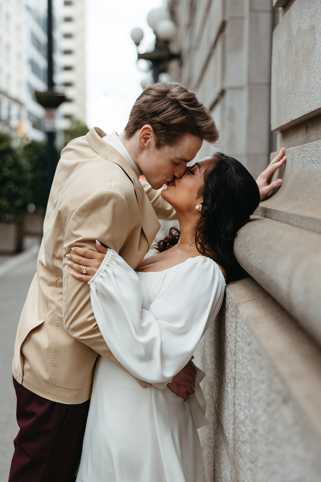 beautiful couple walk the streets of Atlanta during their Georgia engagement photos