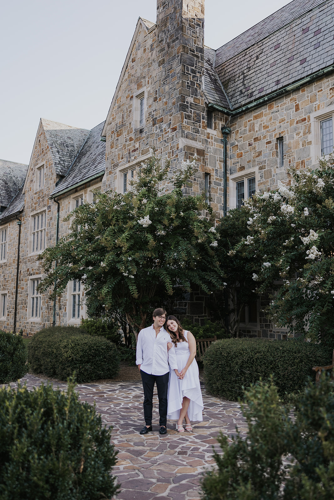 stunning couple pose together during their Berry college engagement photoshoot