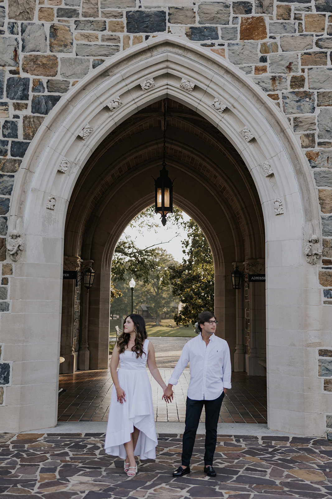 stunning couple pose together during their Berry college engagement photoshoot