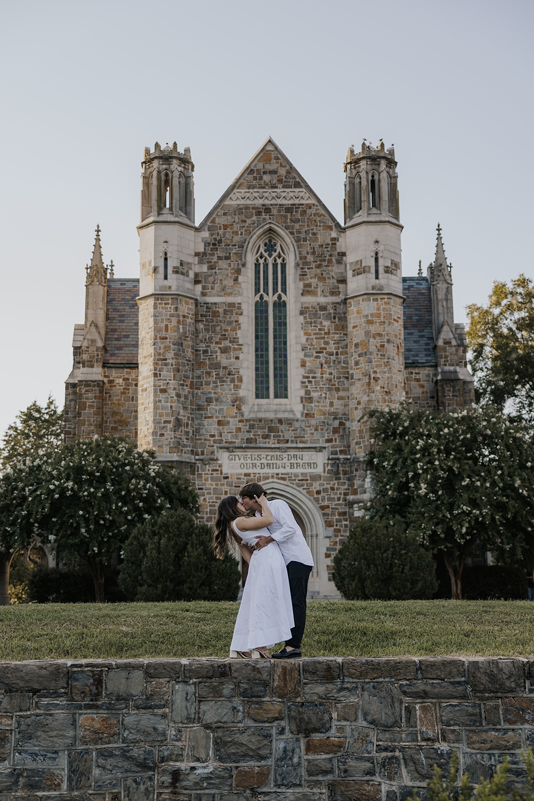 stunning couple pose together during their Berry college engagement photoshoot