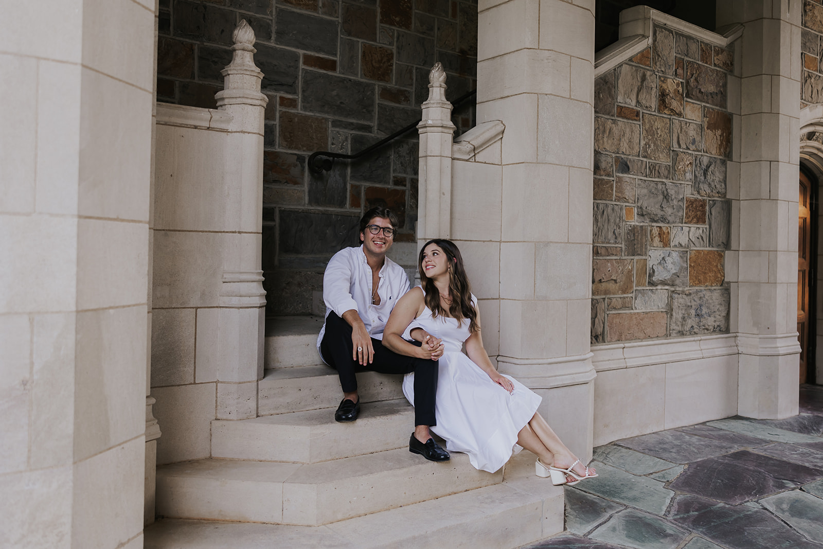 stunning couple pose together during their Berry college engagement photoshoot