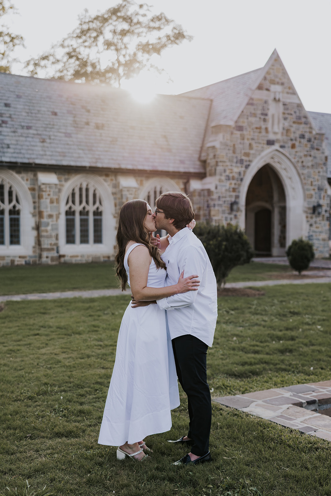 stunning couple pose together during their Berry college engagement photoshoot