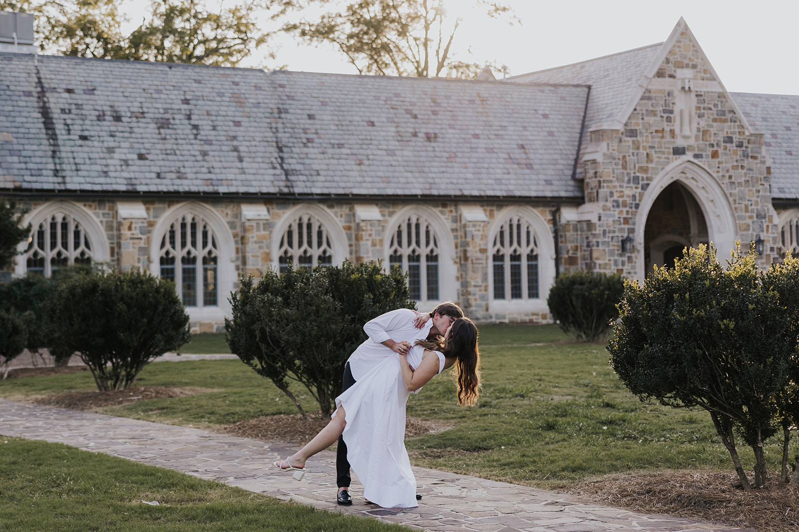 stunning couple pose together during their Berry college engagement photoshoot