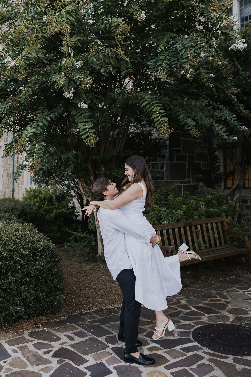 stunning couple pose together during their Berry college engagement photoshoot