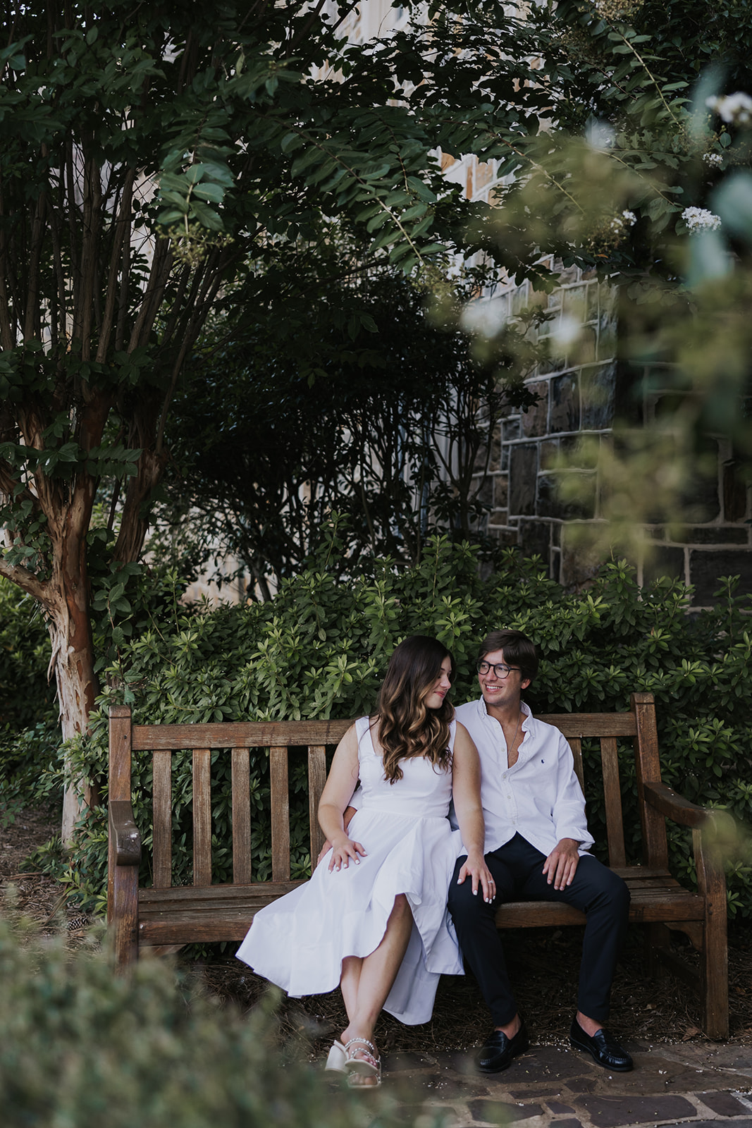 stunning couple pose together during their Berry college engagement photoshoot