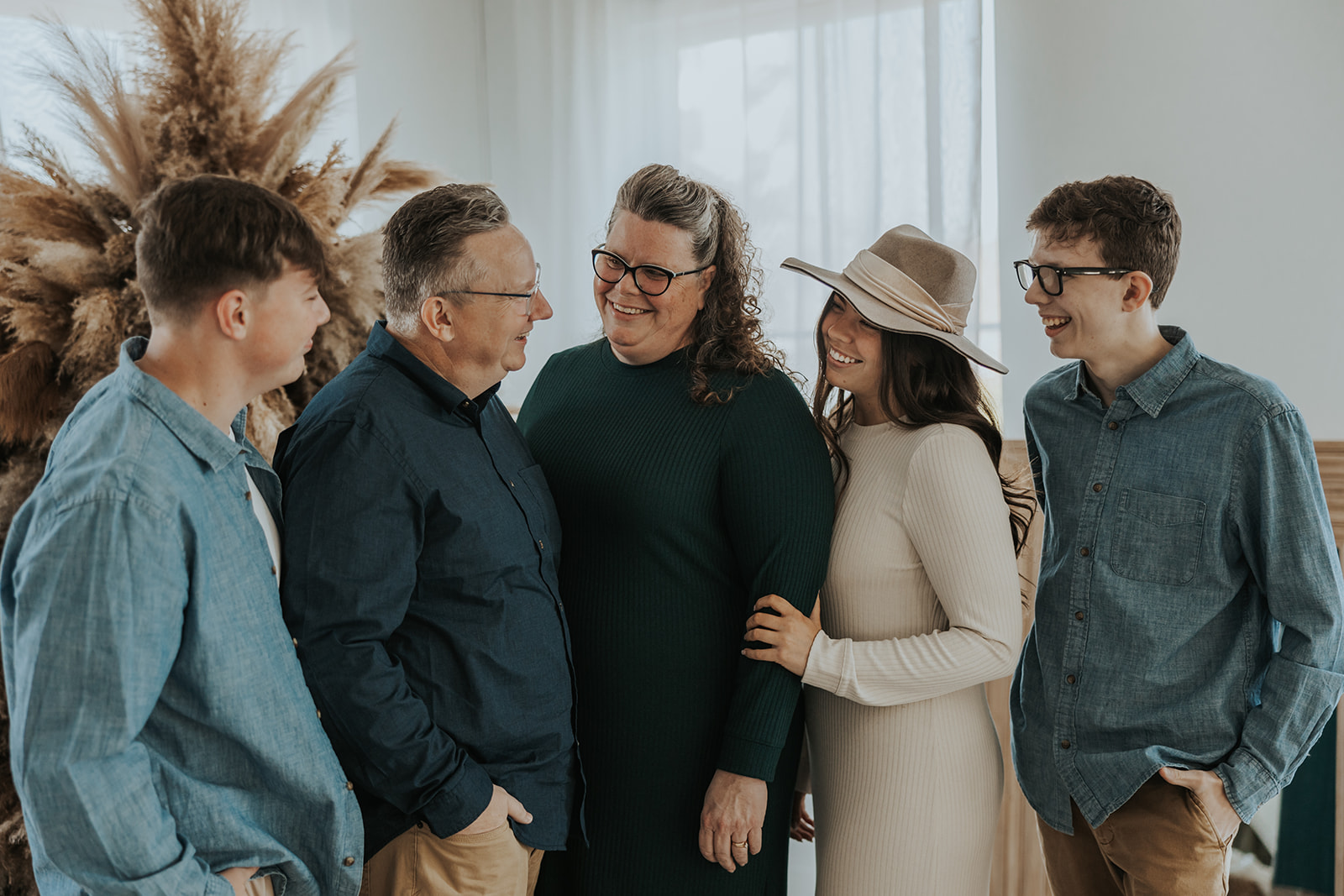 beautiful family pose together during their Family Photos in a Studio