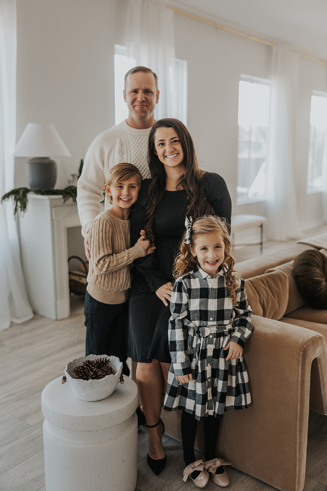 beautiful family pose together during their Family Photos in a Studio