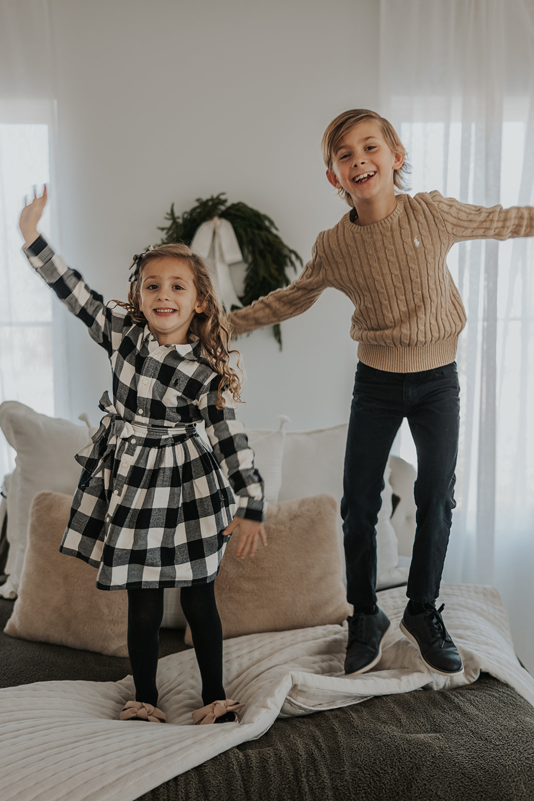 Brother and sister poses during their Family Photos in a Studio