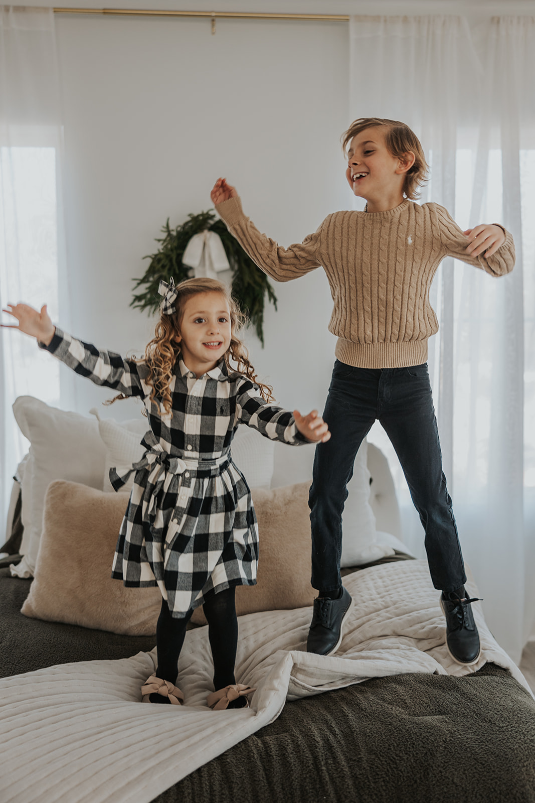 Brother and sister poses during their Family Photos in a Studio