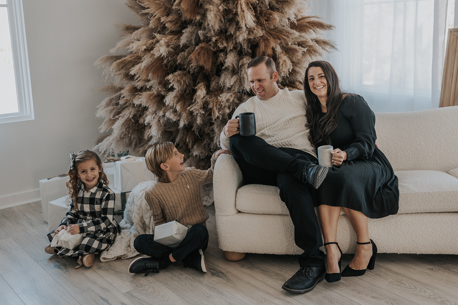 beautiful family pose together during their Family Photos in a Studio