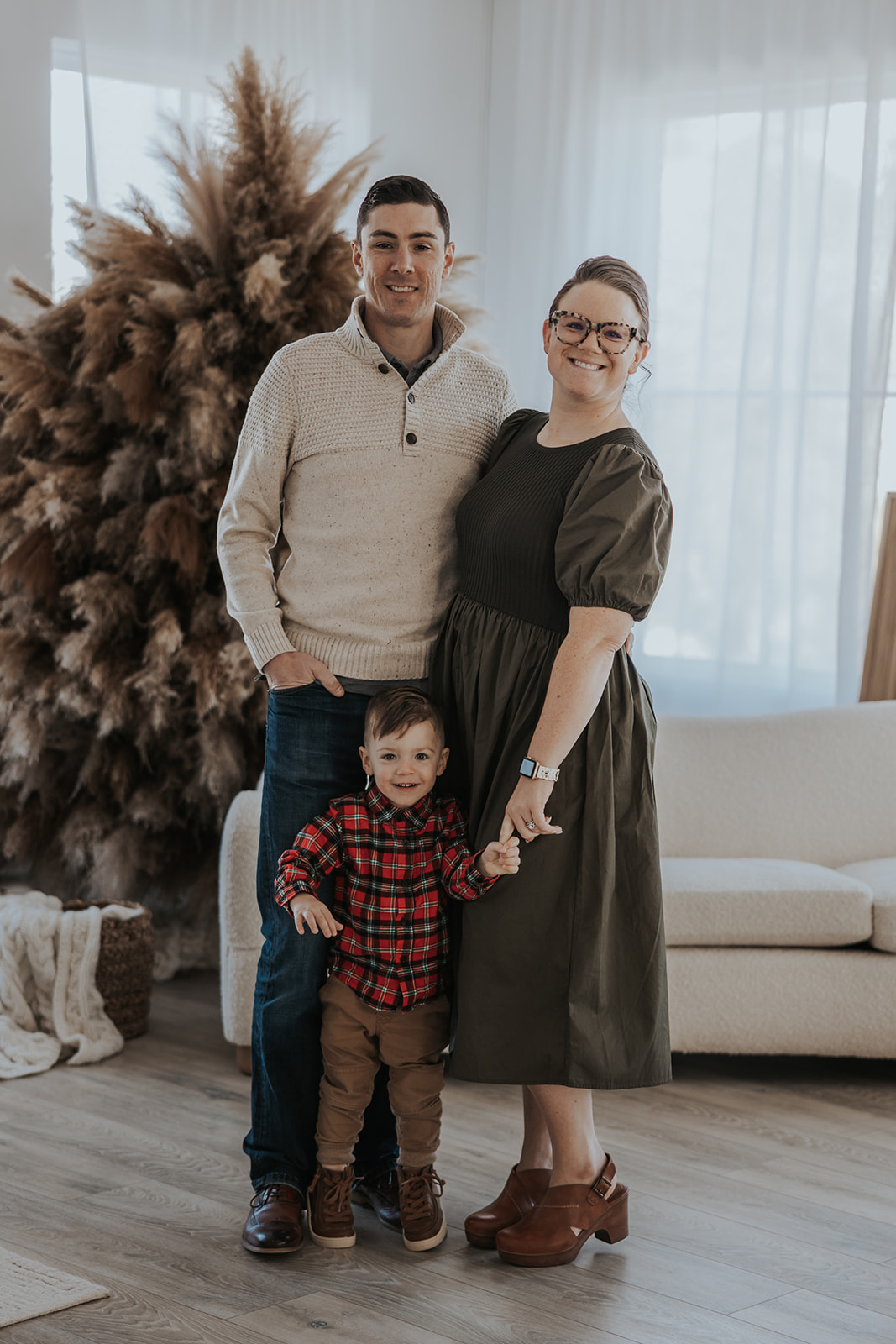 beautiful family pose together during their Family Photos in a Studio