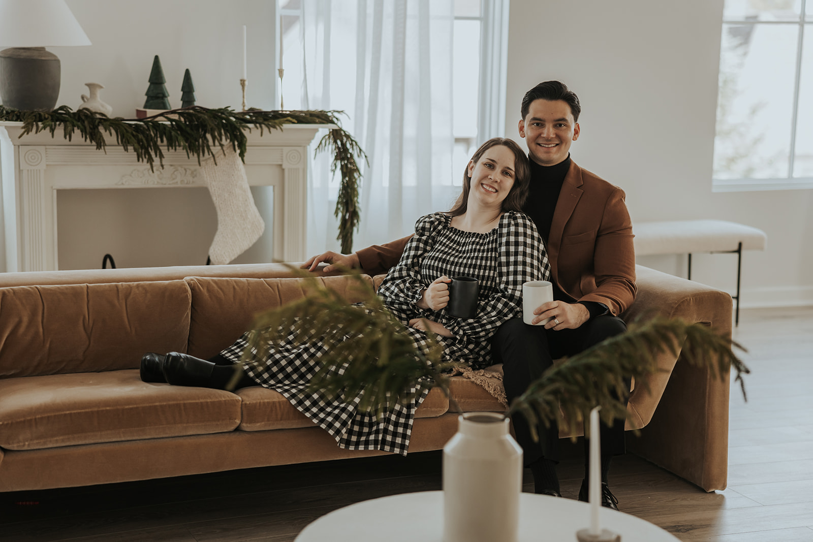 beautiful couple pose together during their in home photoshoot