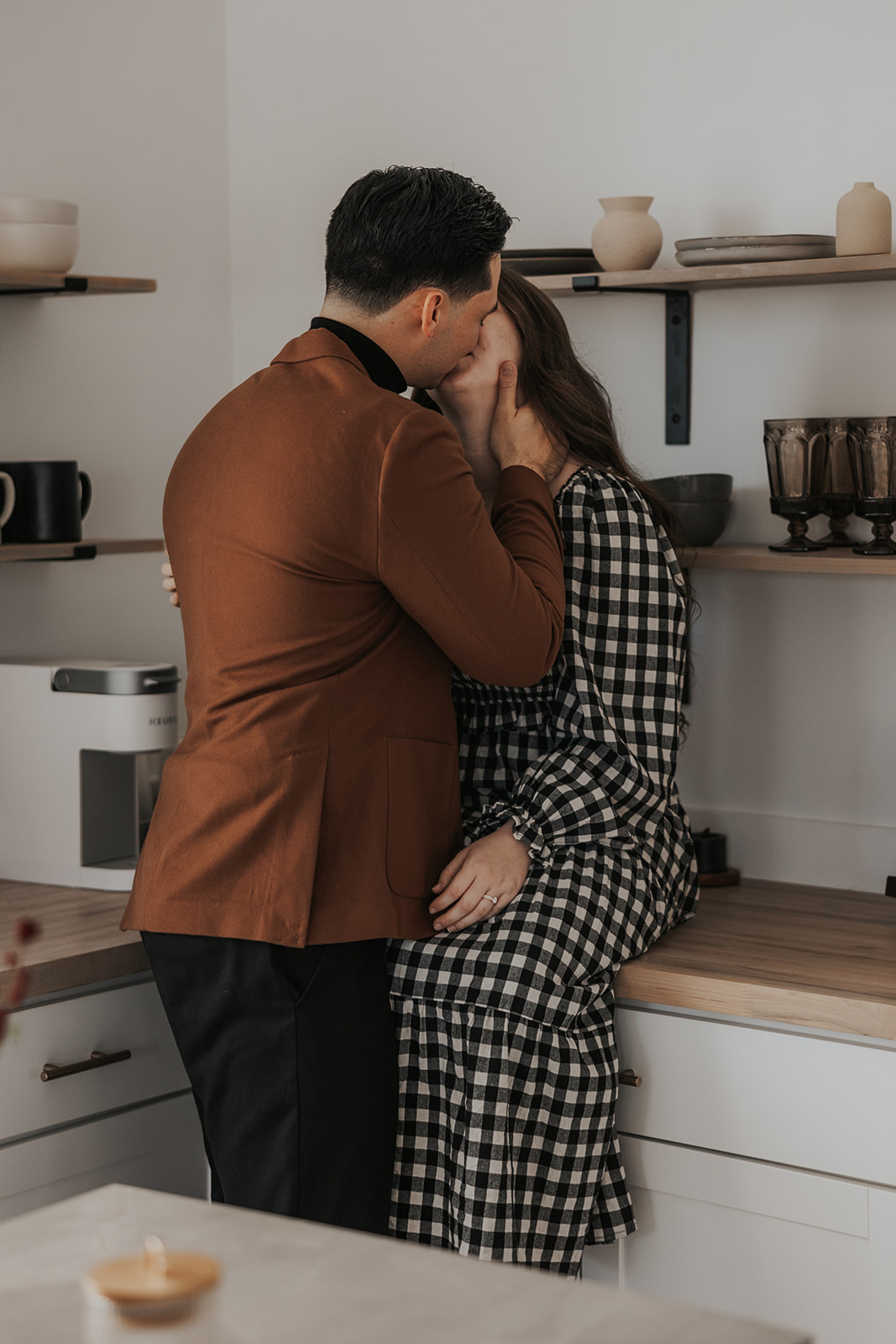 beautiful couple pose together during their in home photoshoot