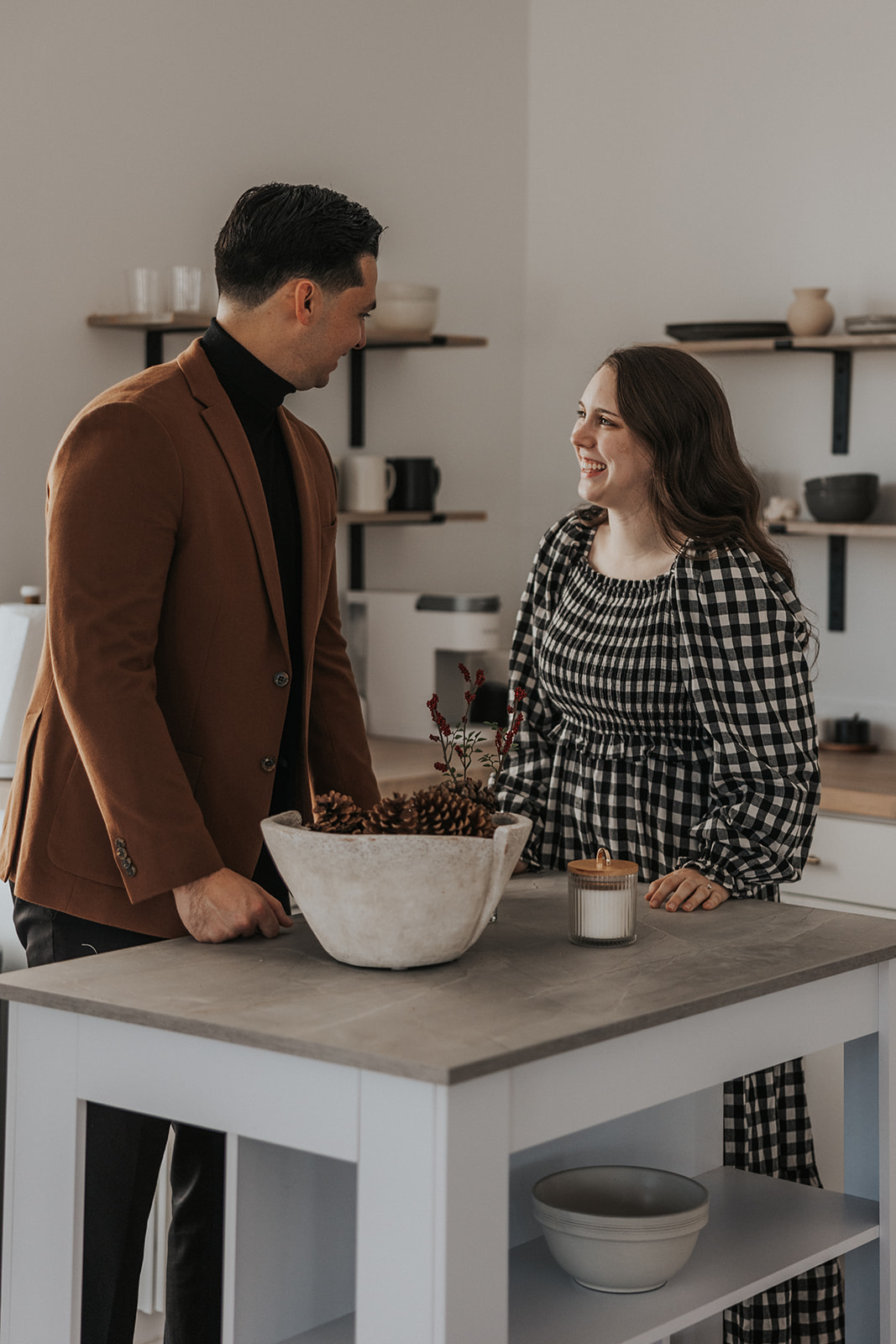 beautiful couple pose together during their in home photoshoot