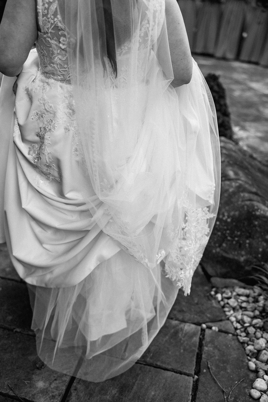 bride walks down the steps to enter her wedding ceremony