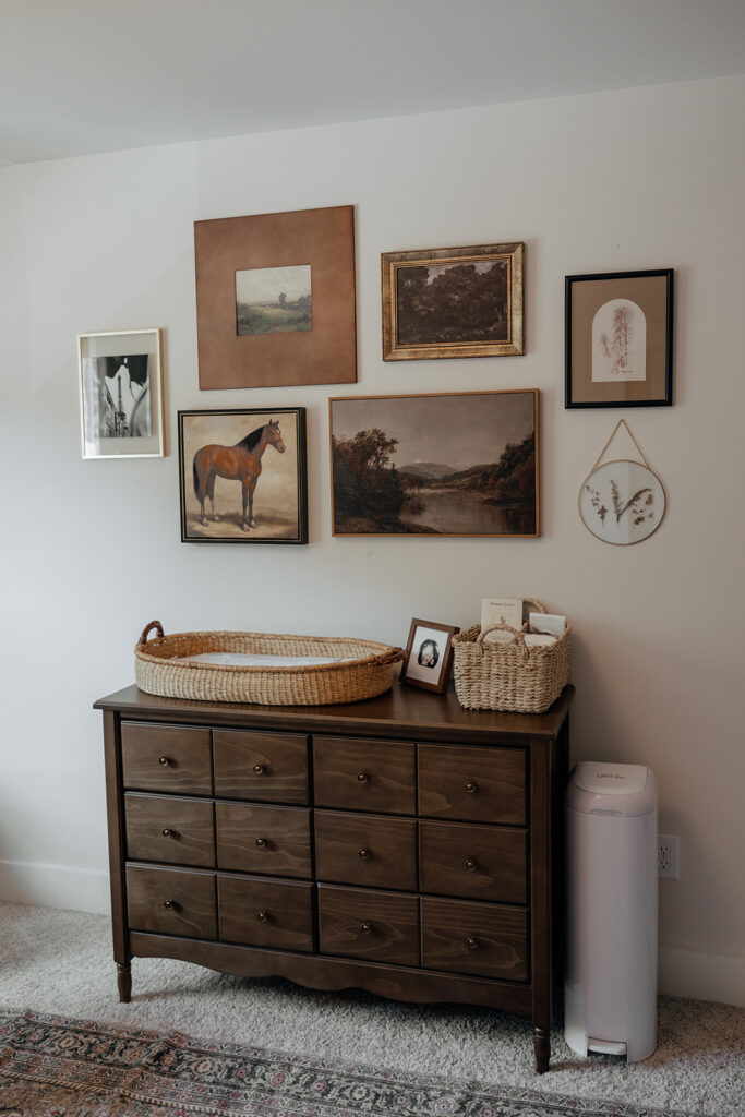 dresser and changing table in a baby nursery