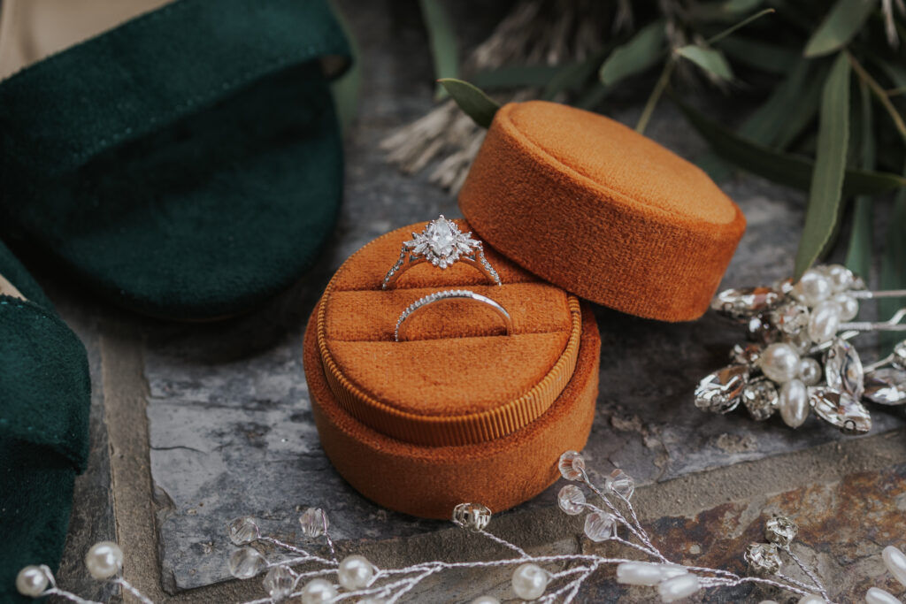 brides wedding ring in a velvet ring box