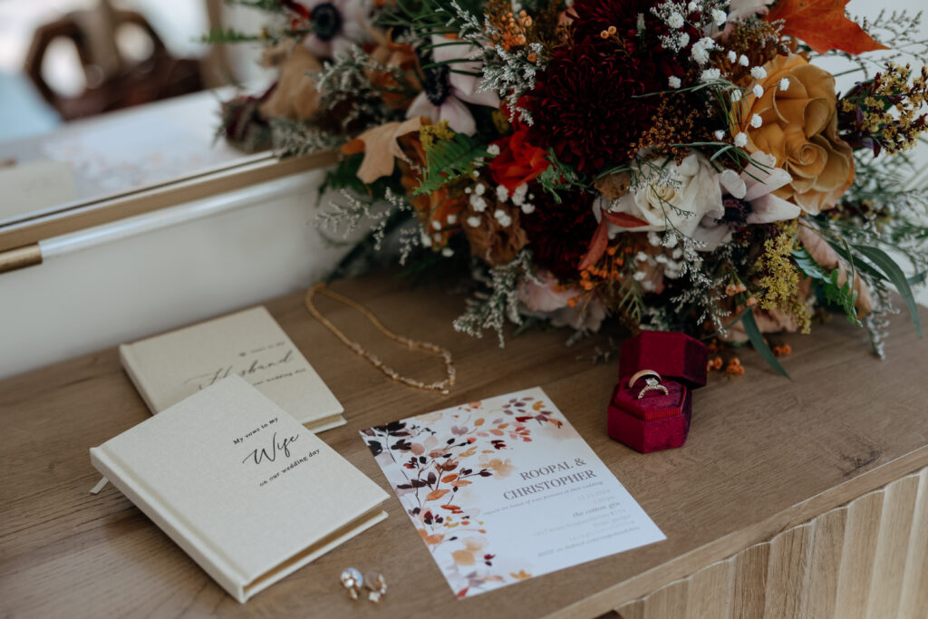 wedding details laying on a table