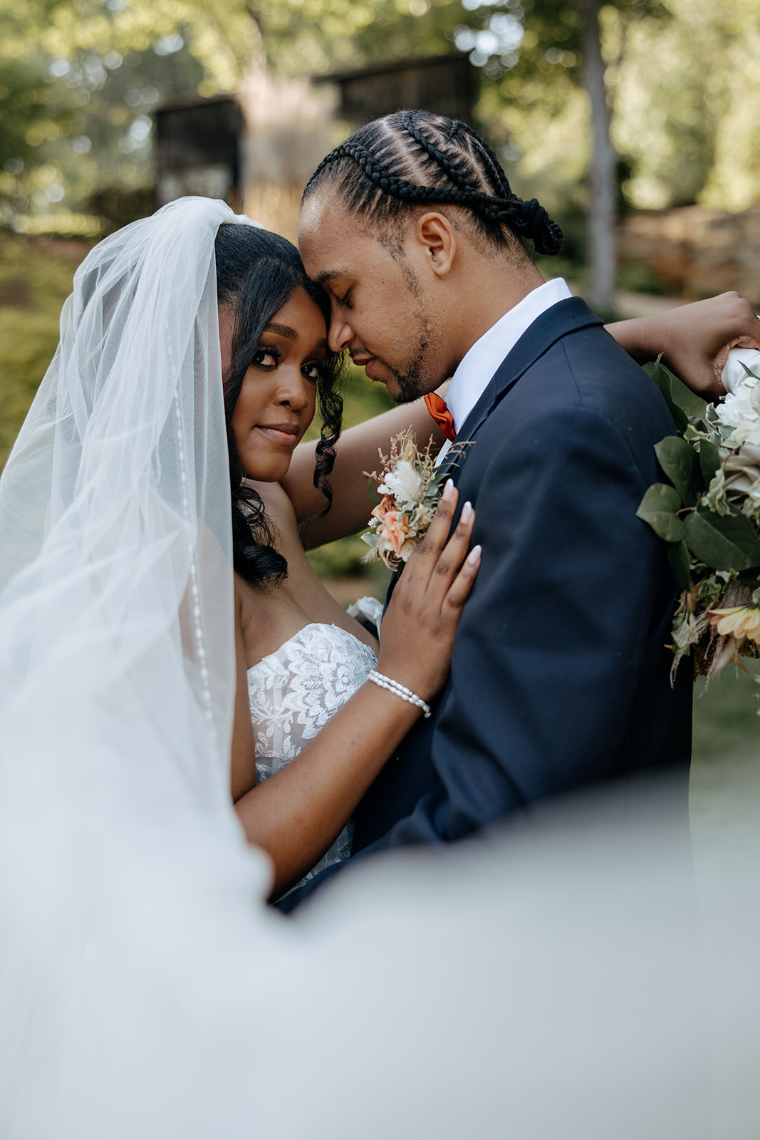 bride and groom embracing on their wedding day